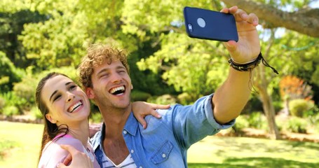 Two friends taking a selfie - Powered by Adobe