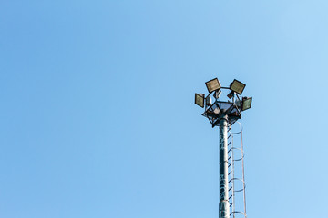 Lamp pole off with blue sky