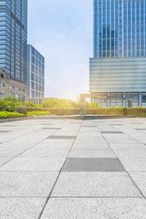 Obraz na płótnie Canvas empty pavement front of modern office buildings