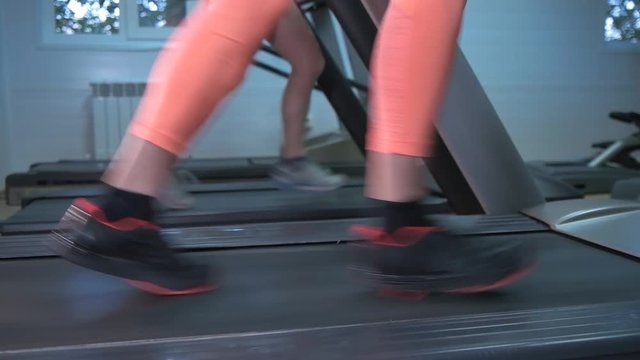 The girl has a treadmill