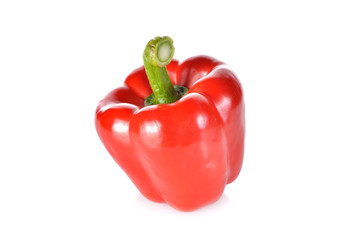 fresh red bell pepper with stem on white background