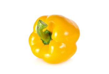 fresh yellow bell pepper with stem on white background