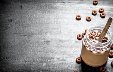 Fitness food. Chocolate flakes with milk.