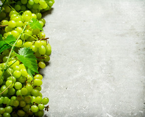 White grapes with leaves.