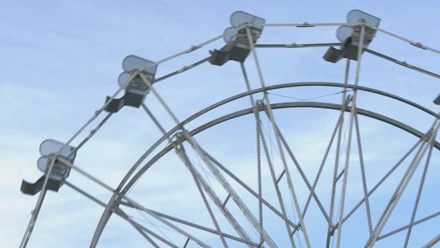 Spinning Ferris Wheel Blue Sky Background