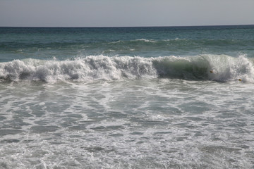 Strong waves on the beach in Phuket, Thailand.