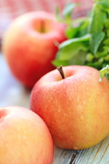 Fresh apples on the wooden table