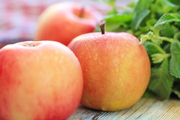 Fresh apples on the wooden table