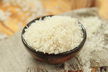 Bowl of raw rice grains
