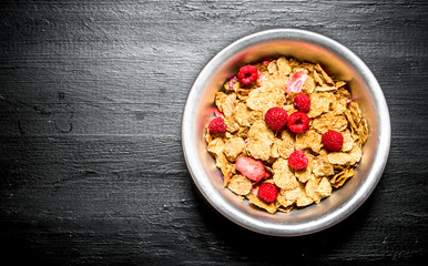 Healthy food. Muesli with raspberries.
