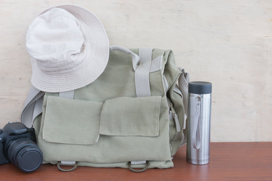 Lifestyle hiking  photo camera bag and thermos