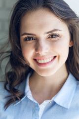 Close up portrait of beautiful young woman face