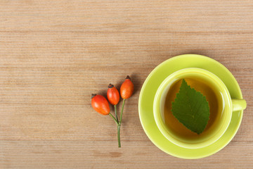 Cup of tea on wooden background