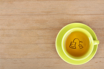 Cup of tea on wooden background