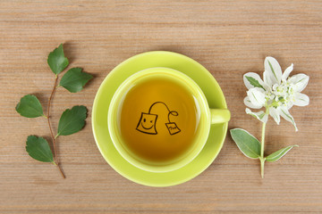 Cup of tea on wooden background