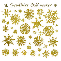 Set of golden hand drawn snowflakes