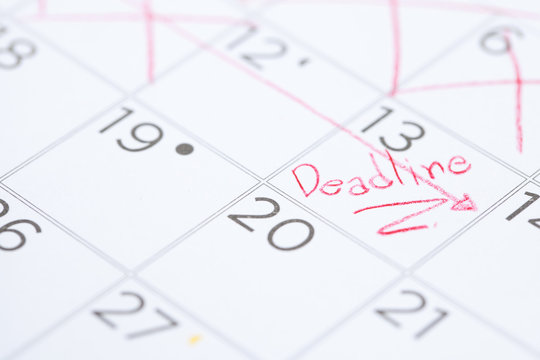 The words Deadline written on a Calendar