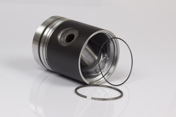 auto piston parts white background isolated
