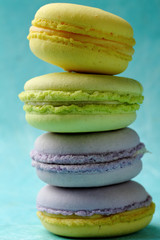 Stack of green and yellow macaroons