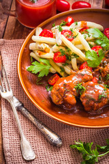 Chicken wings tomato sauce green beans rice