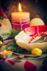 Festively decorated Christmas table tableware candles mood