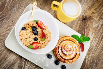 Healthy breakfast on wooden background