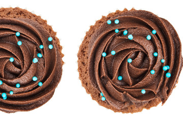 Chocolate cup cake isolated on white background.