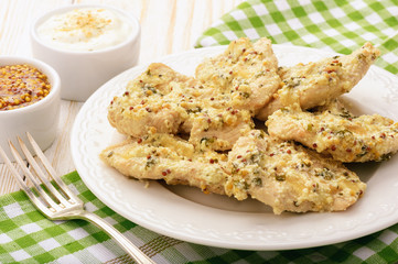 Roasted turkey fillets served  with sour cream, french mustard and parsley.