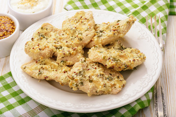 Roasted turkey fillets served  with sour cream, french mustard and parsley.