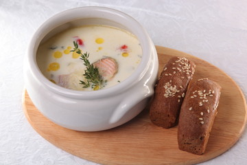 Fototapeta na wymiar Cream soup with smoked salmon