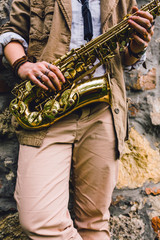 Young woman playing the saxophone