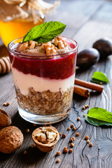 Buckwheat porridge with honey, yoghurt, walnuts and plum puree