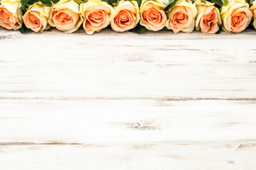 Pink roses on wooden background, valentines day card