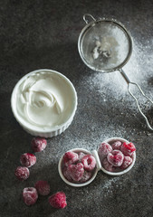 Obraz na płótnie Canvas Frozen raspberry with sour cream