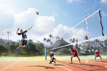 Professional volleyball players in action on the court