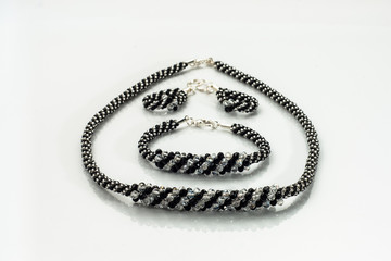 Elegant jewellery set isolated on a white background.