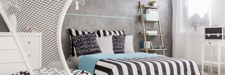 Minimalistic furniture in bedroom interior
