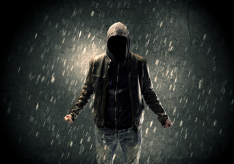 Unknown suspect standing in the dark