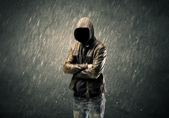 Spooky faceless guy standing in hoodie