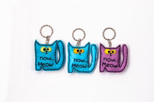 Cats key rings isolated on white background