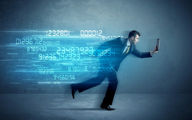 Obraz premium Business man running with device and data concept