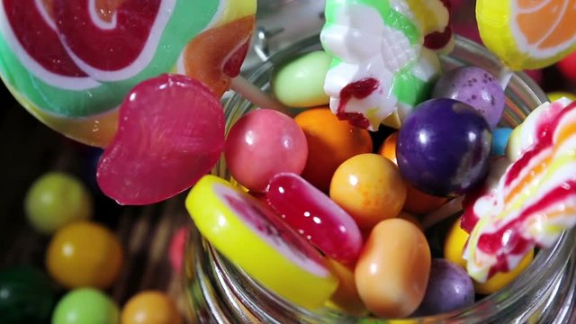 Multi-colored sweets, lollipops and gum