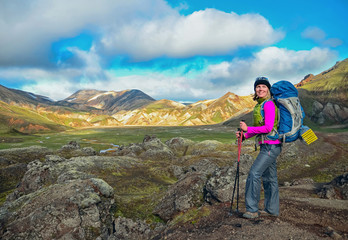 Woman hiker walking in mountain landscape, Iceland