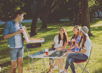 Сheerful friends on picnic