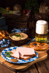 Obraz na płótnie Canvas Bavarian meatloaf with sweetly senf