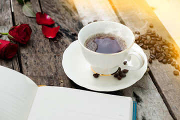 Coffee cup in Morning on old wood background