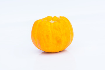 yellow pumpkin on white background