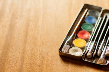 Professional cosmetic. Aqua make up in metal pallet. Usable expensive makeup brushes.