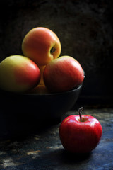 ripe apples on a black background