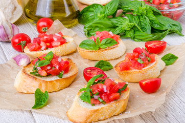 Bruschetta with tomato, onion and fresh basil